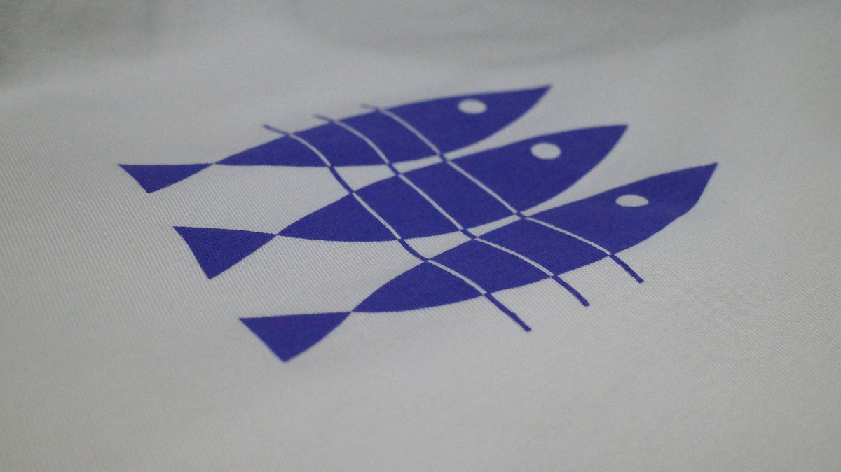 Three hand-drawn sardines screen printed in blue on an organic cotton Contrast t-shirt