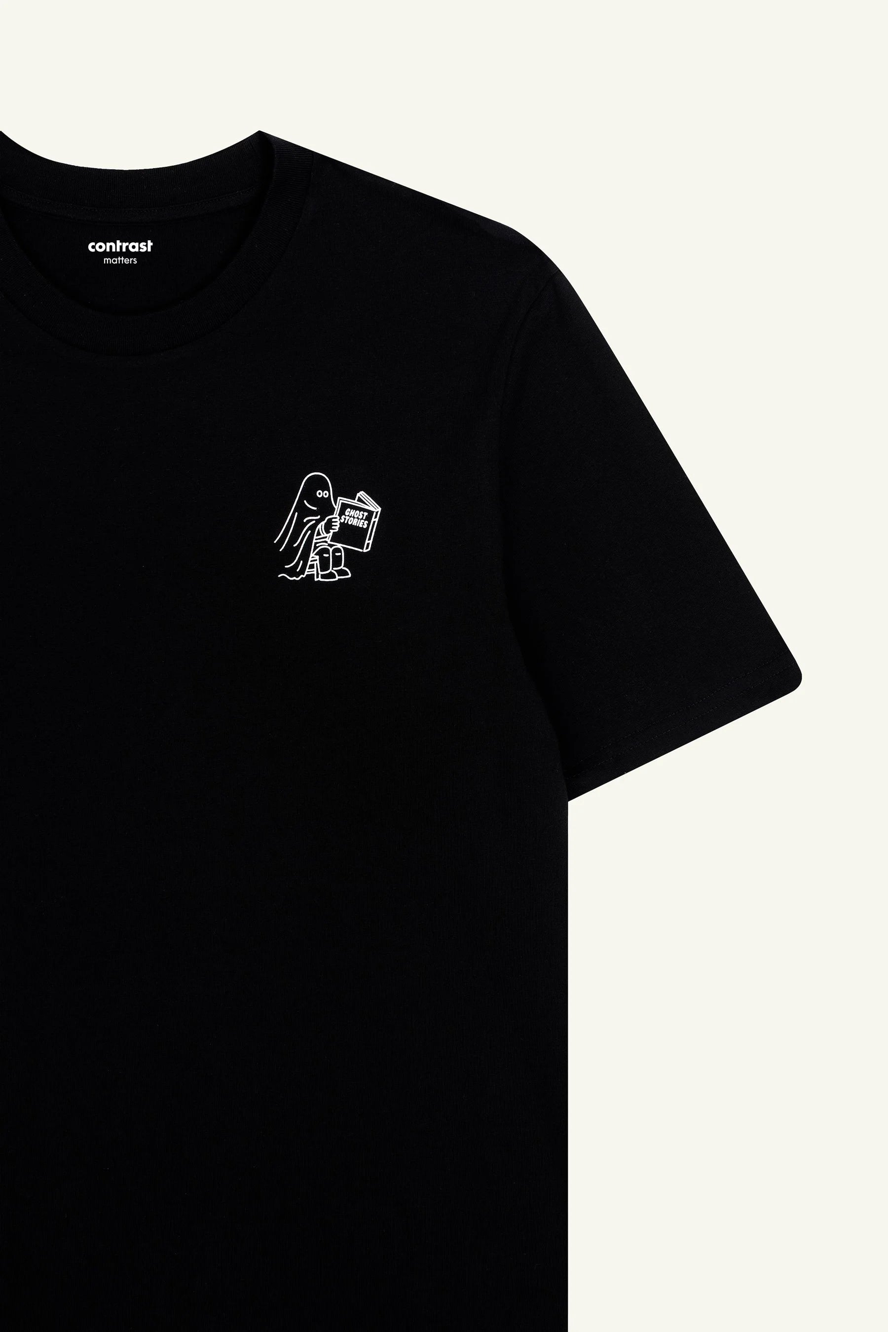Contrast designer graphic tees collection featuring Ghost Stories organic tee shirts in classic black.