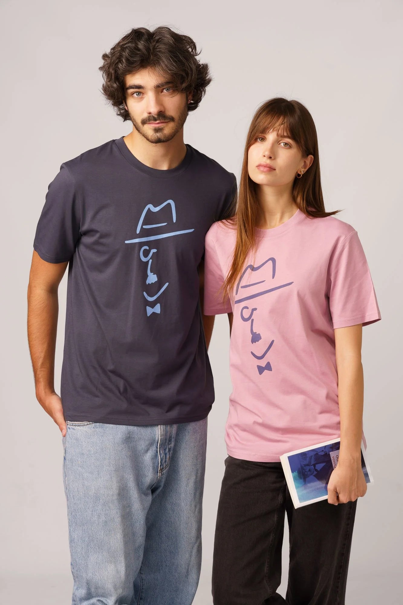 Contrast designer graphic tees collection featuring Pessoa Sketch organic tee shirts with line art portrait.