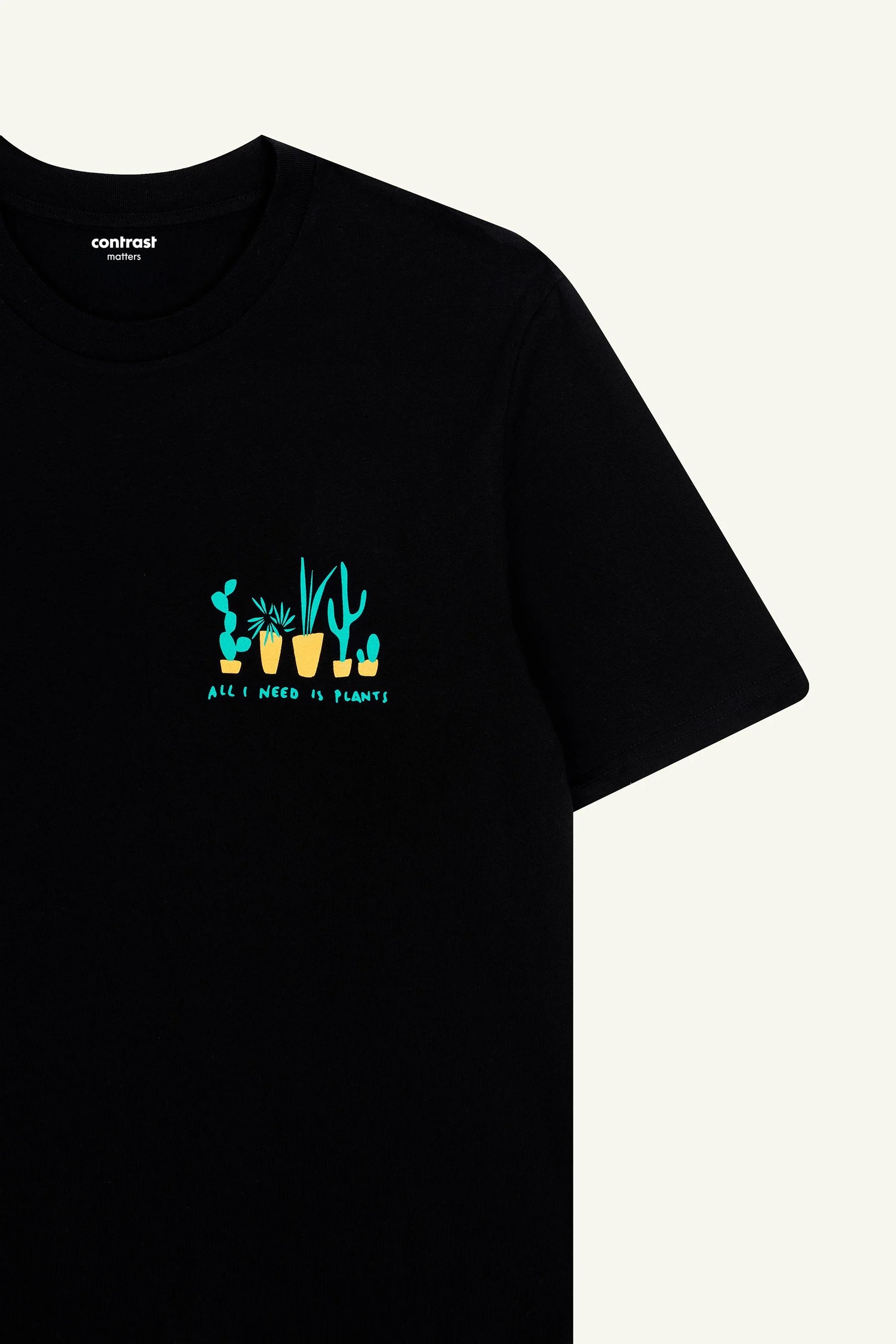 Contrast designer graphic tees collection featuring All I Need Is Plants organic t-shirt in Black.