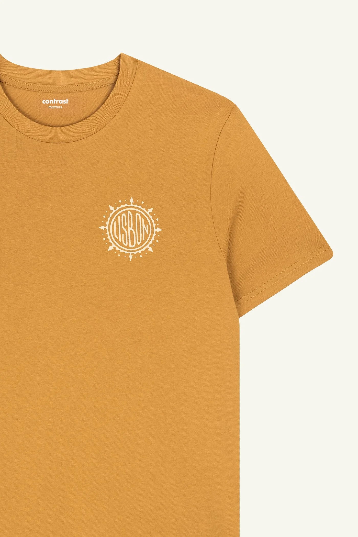 Contrast designer graphic tees collection featuring Wind Rose organic tee shirts with compass-inspired artwork.