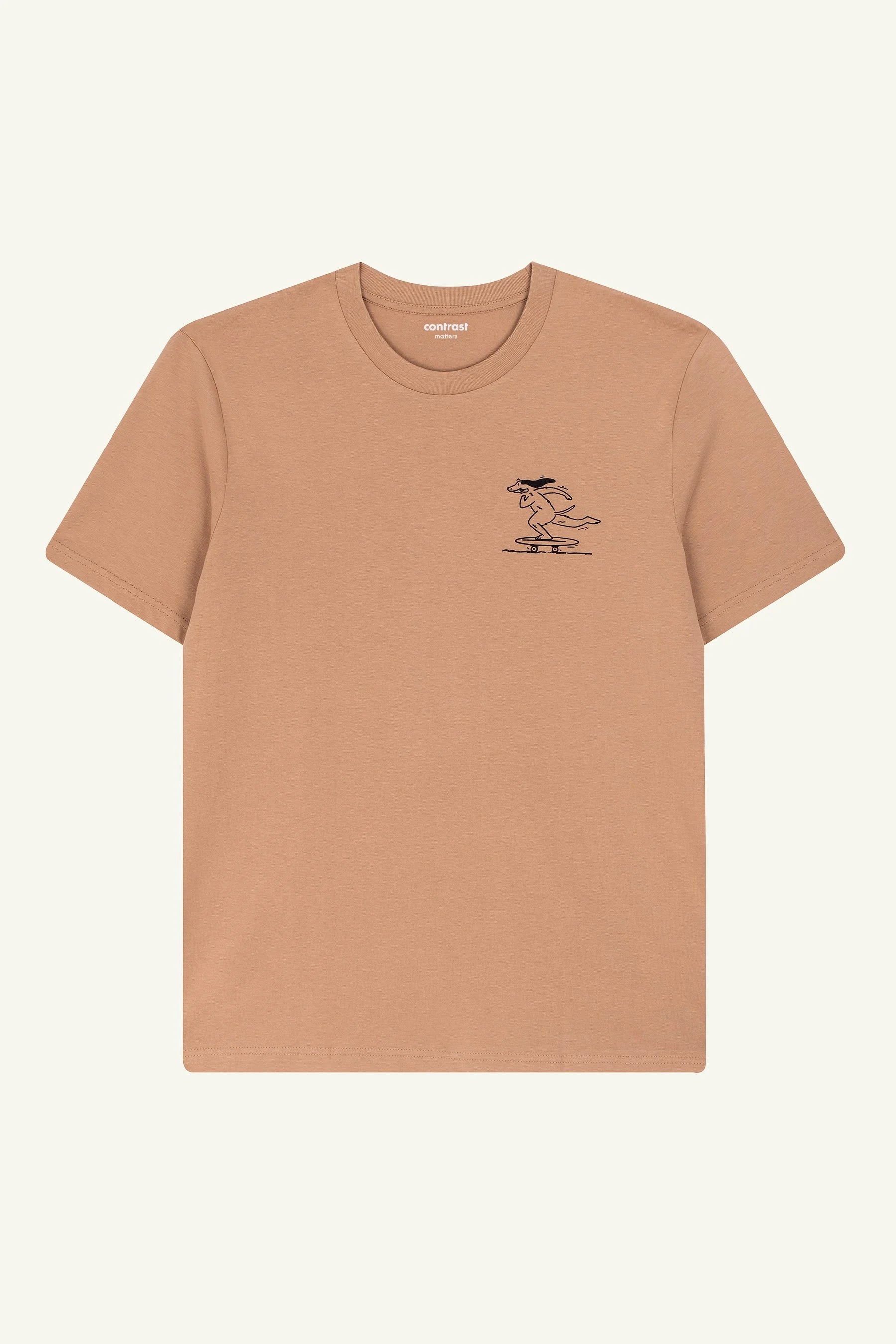 Contrast Skate Rider graphic t-shirt in Latte Brown, organic cotton designer graphic tee with dog on skateboard artwork.