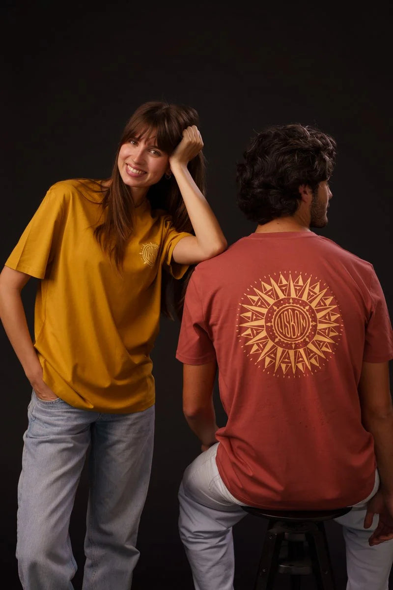Contrast designer graphic tees collection featuring Wind Rose organic tee shirts with compass-inspired artwork.