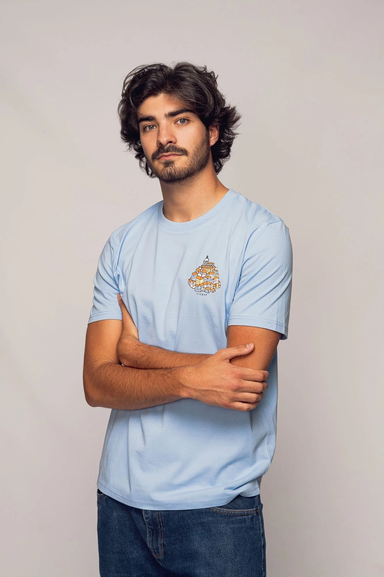 Organic t-shirt by Contrast, Alfama Hill t-shirt graphic design with stacked houses illustration.